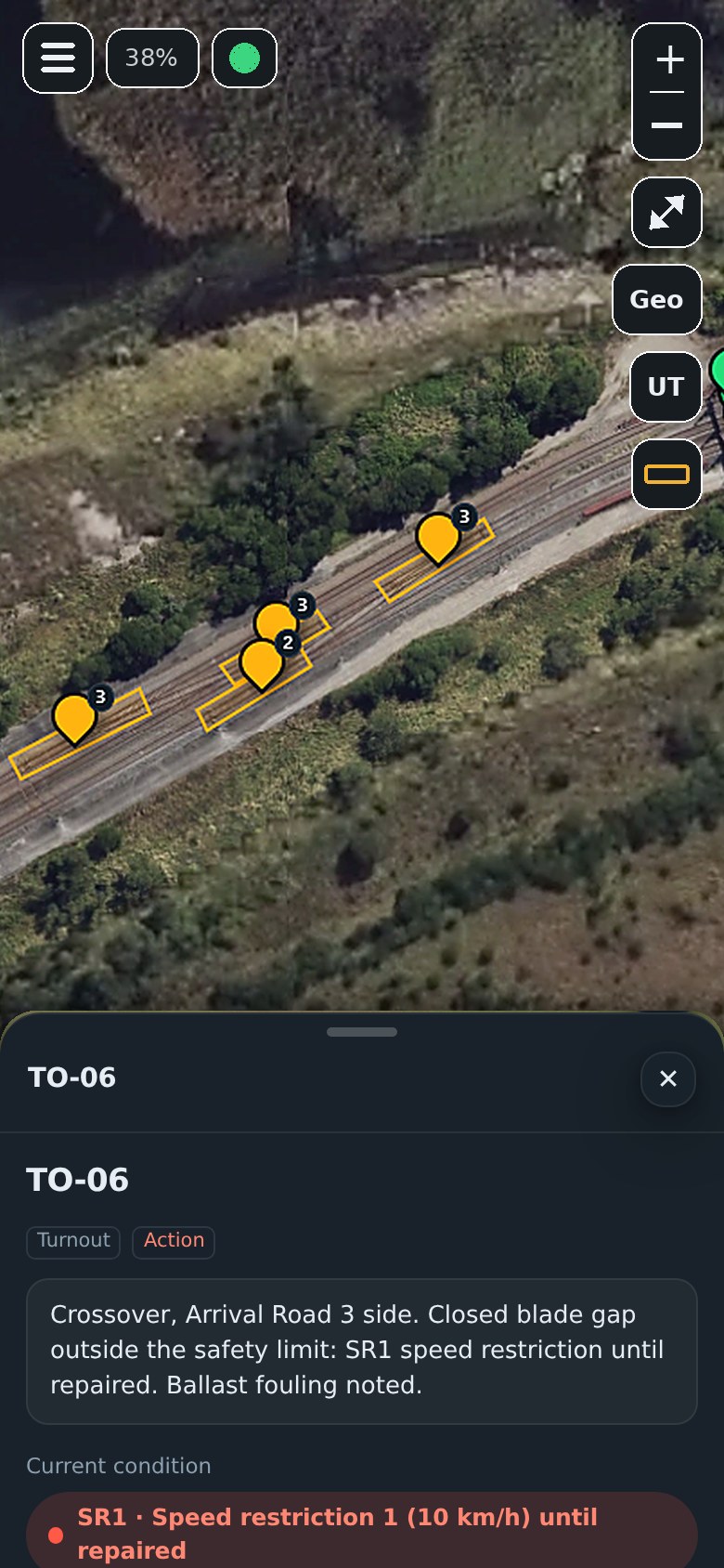 The Align Rail field app on a phone, showing turnouts over aerial imagery with one turnout open under an SR1 speed restriction